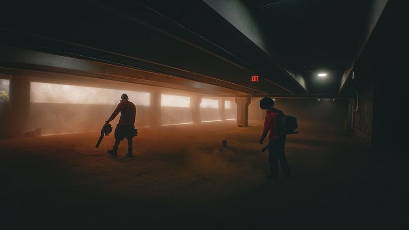 POW crew cleaning a commercial parking garage