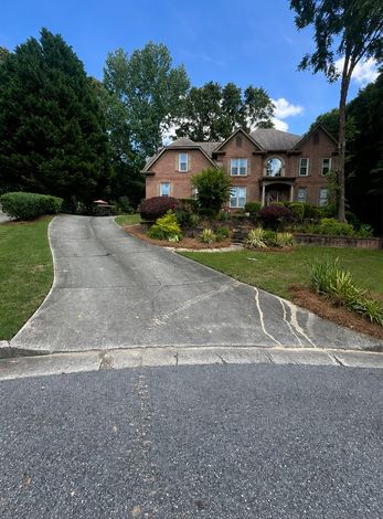 Driveway pressure washing before cleaning