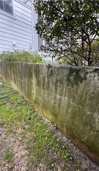 Retaining wall before cleaning