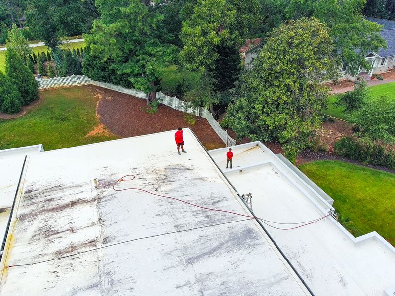 Roof cleaning in progress