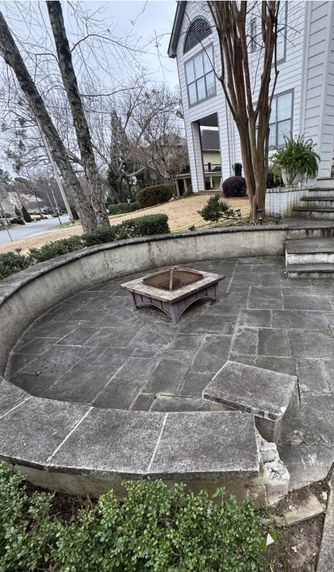 Stone patio & fire pit before cleaning